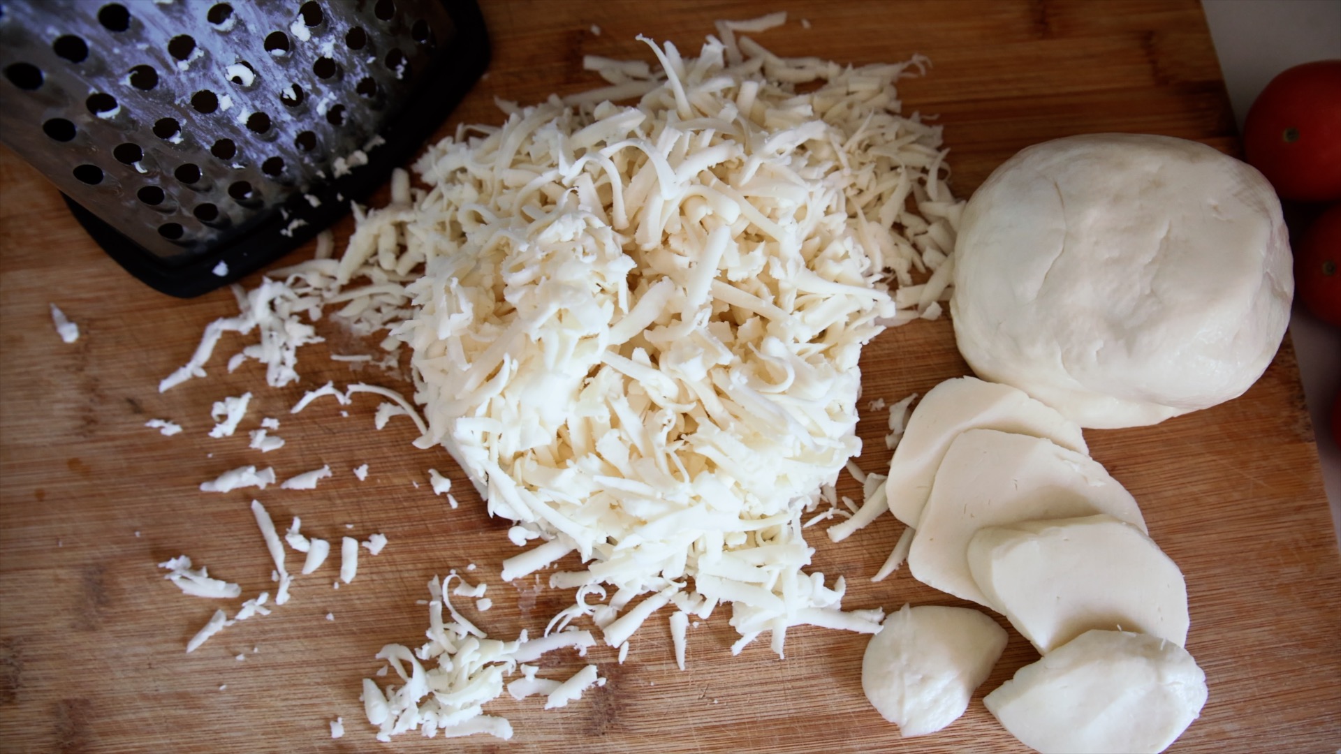 A pile of freshly shredded goat milk mozzarella.